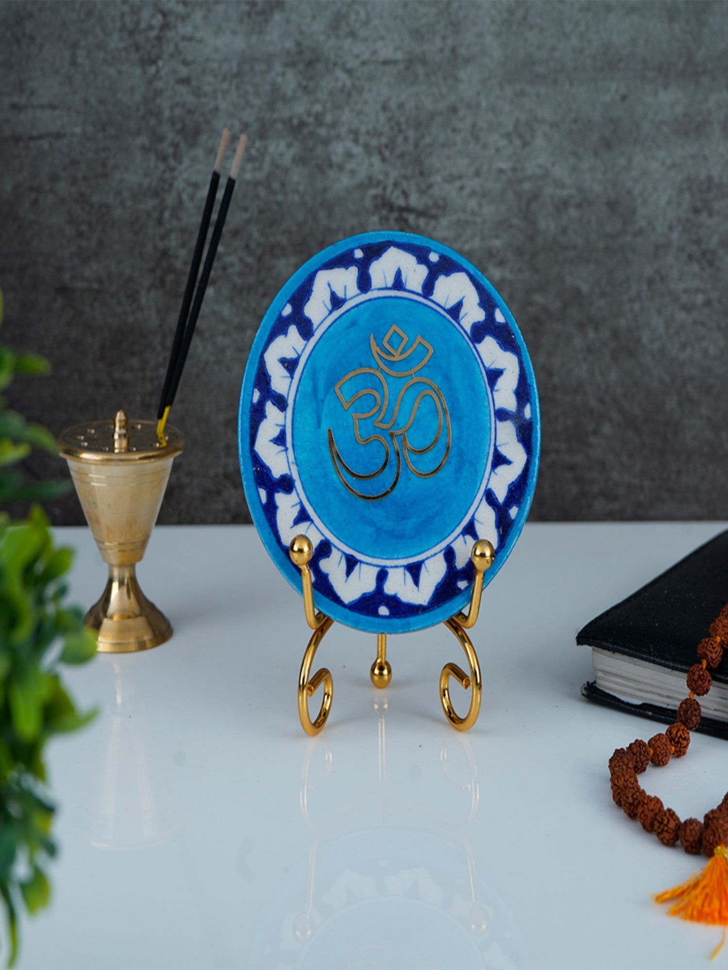 Om Handcrafted Blue Pottery Showpiece