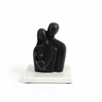 Abstract Family Bond Black Sculpture with White Marble Base