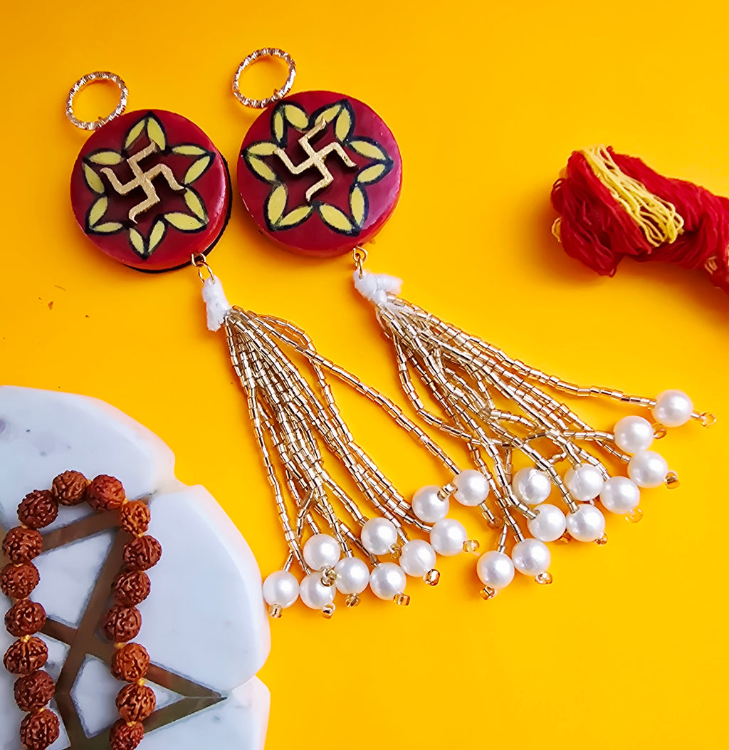 Blue Pottery Red Floral Print Swastik Door Hangings